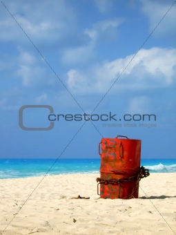 A barrel on the beach.