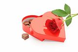 Chocolate box and red rose - isolated