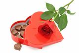 Chocolate box and red rose