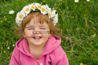 Simply happy girl with daisy wreath