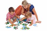 Family playing with puzzle