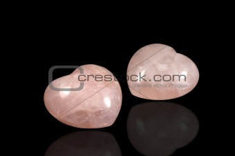Two polished stoned hearts