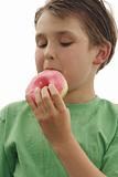 Child eating a doughnut