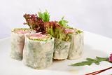 Image of sushi decorated with lettuce