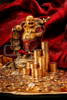 Laughing Budda with golden coins