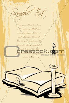 open book with candle stand
