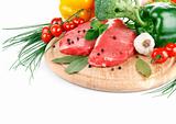raw meat with fresh vegetables