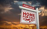 White Foreclosure Home For Sale Real Estate Sign Over Beautiful Clouds and Sunset Sky.