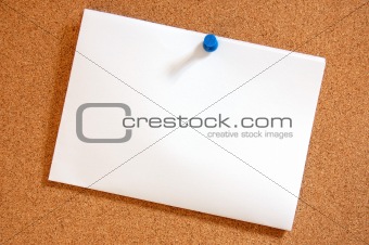 blank sheet of paper on bulletin board