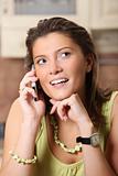 Young wife talking on the cell phone
