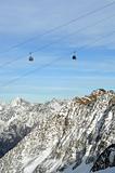 Gondola Ski Lift above Alps Mountains