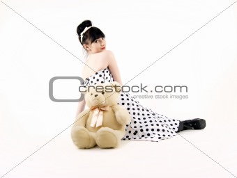 Young woman with teddy bear 