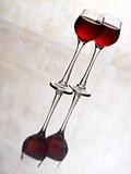 Two wine glass on mirror