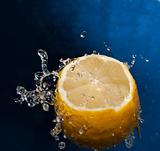 Water splash on a lemon