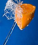 Water splash on a orange