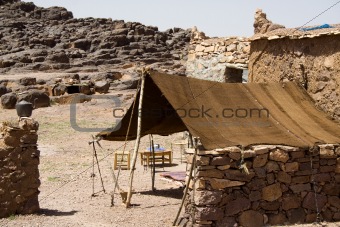 A berber tent in Moroco in Africa with a kettle.