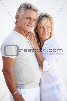 Happy mature couple smiling