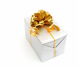 White gift with gold bow