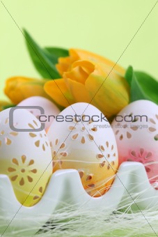 Flowery Easter eggs in an egg holder