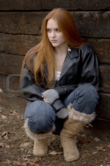 red haired girl looking away