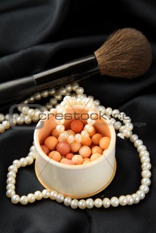 white pearl with powder in a box