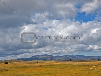 Steppe landscape with mountains on horizont