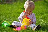 Baby girl play on grass