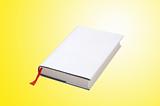 White book over yellow background