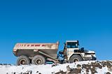 Dump Truck on a Construction Site in Winter