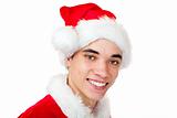 Attractive male teenager dressed as santa claus smiles happy