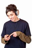 Teenager with headset use mp3 music player