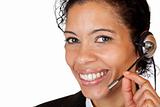Smiling attractive woman makes with headset a call