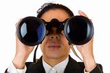 Woman looks through binoculars searching for business