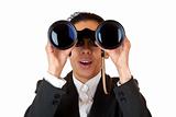 Woman looks through binoculars searching for business