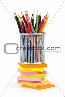 Reminders and color pencils isolated on the white