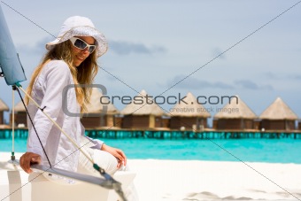 Lady on a white yacht