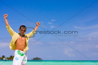 young man on a tropical beach