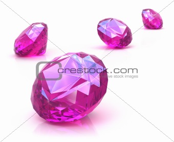 Ruby gemstones on white surface