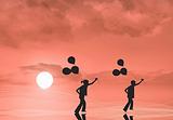 Silhouette of children with balloons
