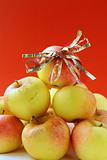 yellow ripe apples with a ribbon