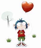 Boy holding a love heart balloon