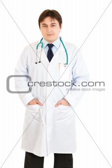 Smiling young medical doctor in uniform with stethoscope
