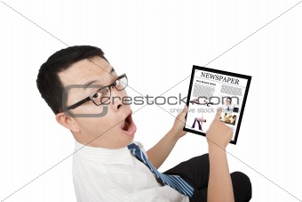 Businessman holding a touch pad pc and surprised expression