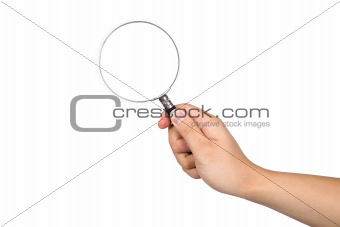 Hand-held magnifying glass in white background