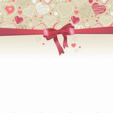 Greeting card with red bow and hearts