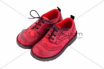 Red kid luxury shoes isolated on white