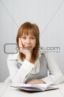 attractive young woman in a business office