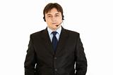 Smiling modern businessman with headset
