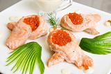 Fried salmon filet with red caviar