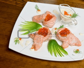 roasted salmon filet with red caviar
